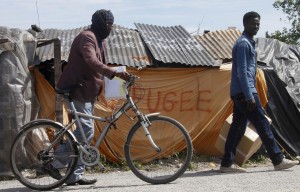 Calais refugee camp ( Michel Spingler:AP) June 26 2015