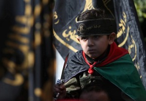 Palestinian child in Gaza with knife ( Ibraheem Abu Mustafa:Reuters) Dec 22 2015