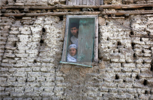 Kashmiris watch proetst from window ( (Photo- Danish Ismail:Reuters) Aug 8 2016