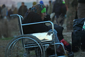 Evacuee from e Aleppo in wheelchair (REUTERS:Ammar Abdullah) Dec 17 2016