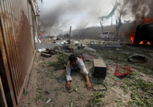 A wounded man lies on the ground at the site of a blast in Kabul, Afghanistan. REUTERS:Omar Sobhani June 1 2017