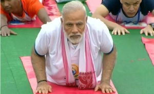 World Yoga Day 2017- PM Narendra Modi performs yoga with participants in Lucknow.