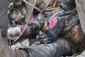 Eastern Ghouta child in rubble (White Helmets) Feb 26 2018