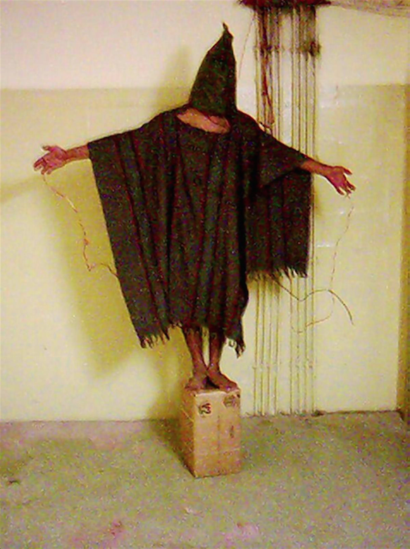 Hooded-man-at-Abu-Ghraib.png