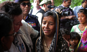 Karen Pierce, UK ambassador to UN & 12-yr-old Rohingya girl (- Michelle Nichols:Reuters) May 2 2018